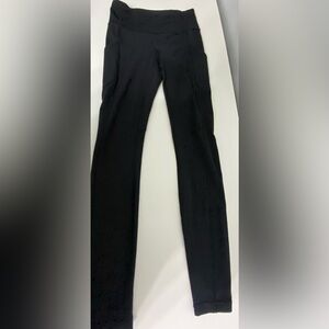 Black lululemon leggings with pockets and zipper